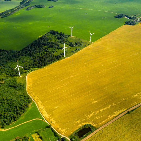 windmills-in-summer-in-a-green-field-large-belarus-UT32GFR